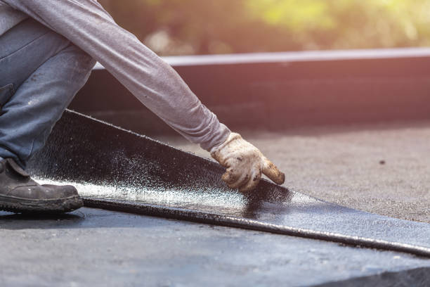 Professional Emergency Waterproofing technician working in Hudson, WI